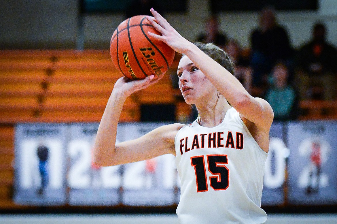 Flathead's Clare Converse (15) sinks a three in the fourth quarter against Butte  at Flathead High School on Friday, Feb. 4. (Casey Kreider/Daily Inter Lake)