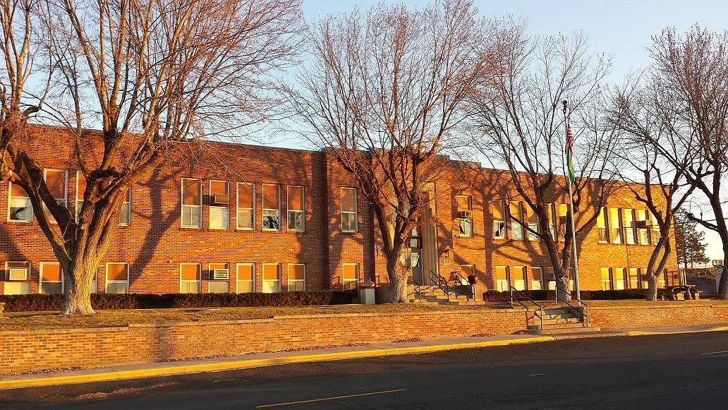 The Wilson Creek School District building is shown.