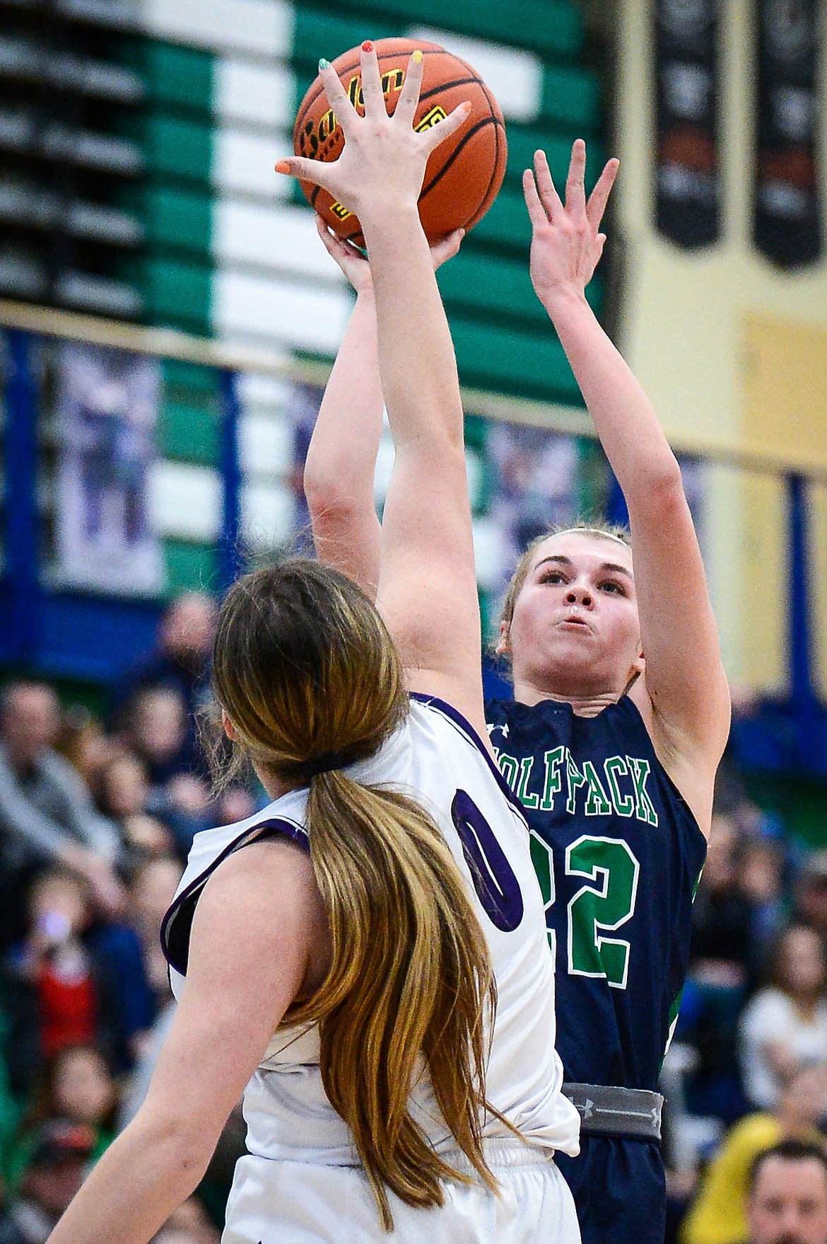 Glacier's Noah Fincher (22) looks to shoot guarded by Butte's Brooke Groesbeck (50) at Glacier High School on Saturday, Feb. 5. (Casey Kreider/Daily Inter Lake)