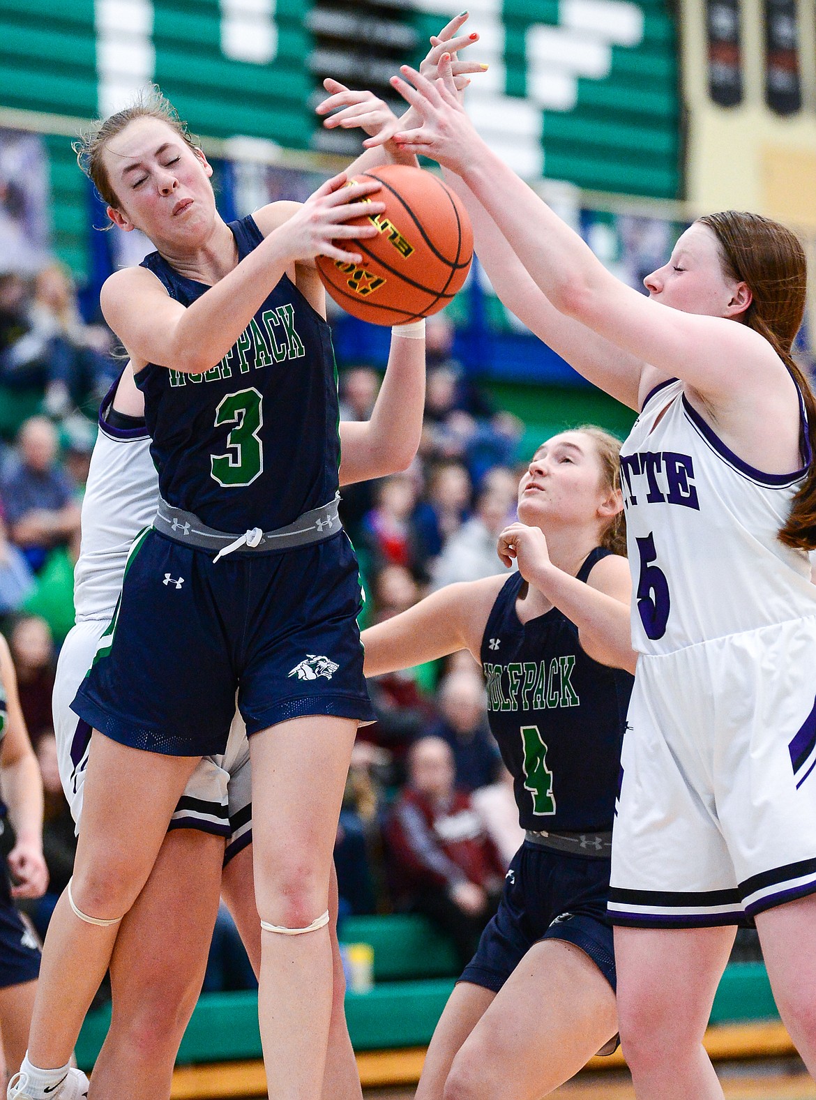 Glacier's Sarah Downs (3) fights for an offensive rebound with Butte's Payton Clary (5) at Glacier High School on Saturday, Feb. 5. (Casey Kreider/Daily Inter Lake)