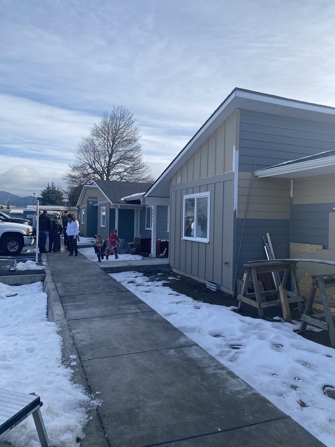 A six-unit housing complex was dedicated Saturday at 3433-3439 North Fruitland Lane in Coeur d'Alene. Brought to fruition by North Idaho Habitat for Humanity, the complex will provide affordable, entry-level housing via homeownership for six local families.