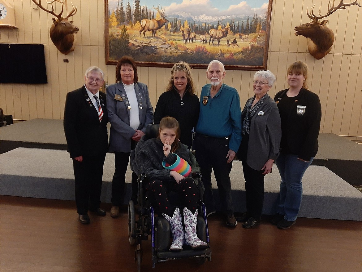 Pictured left to right are Carol Beaudion, Elks Lodge treasurer; Janeen Lembke, Lodge secretary; Sabrina Wisher-DeWitt, founder of Makalya’s Miracles and Blessings Foundation; Bob Stephens, Grand Lodge community person; Carmel Stephens, past Elks state president; Elizabeth Wood, D.D.G.E.R.; and seated in front is Makayla Wisher.