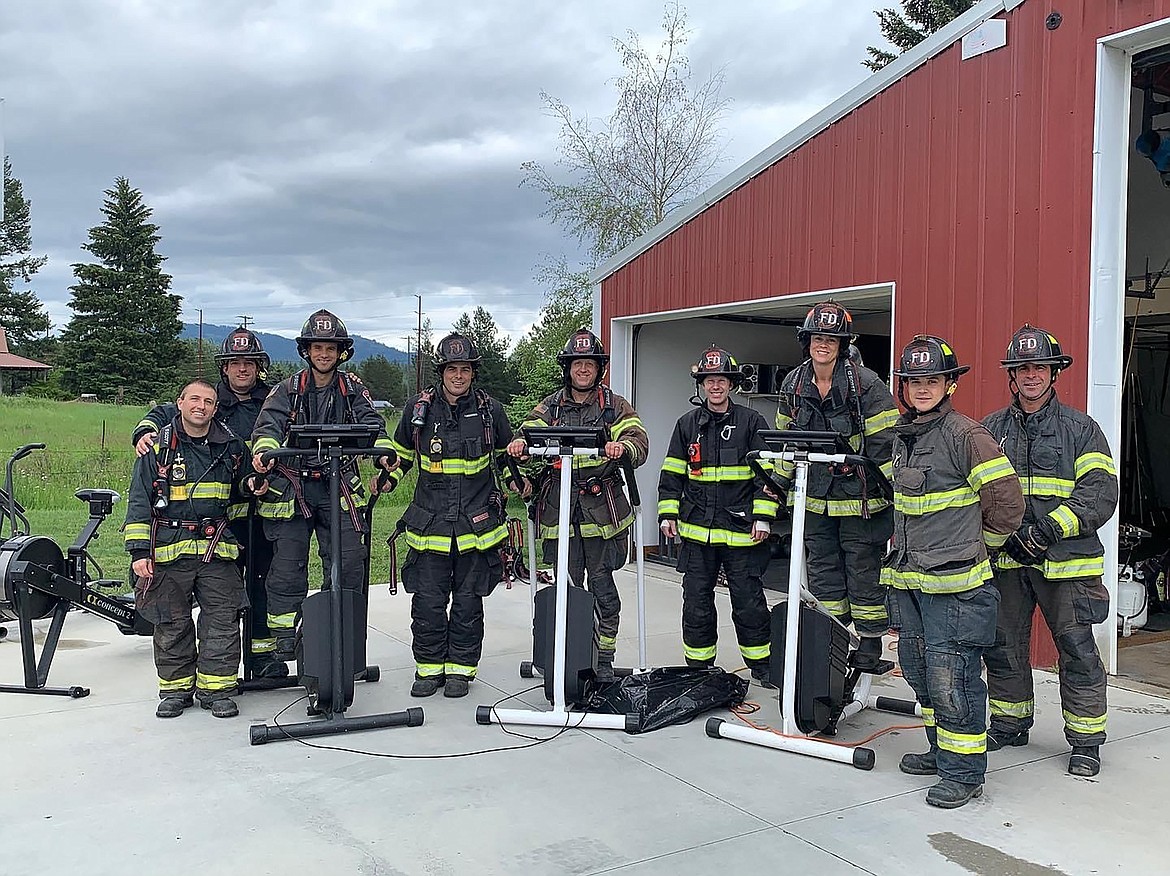 Members of the Selkirk Fire & Rescue team pause from getting ready for the Scott Firefighter Stairclimb to get their photo taken. The team is holding a fundraiser Saturday at Super 1 Foods in Sandpoint.