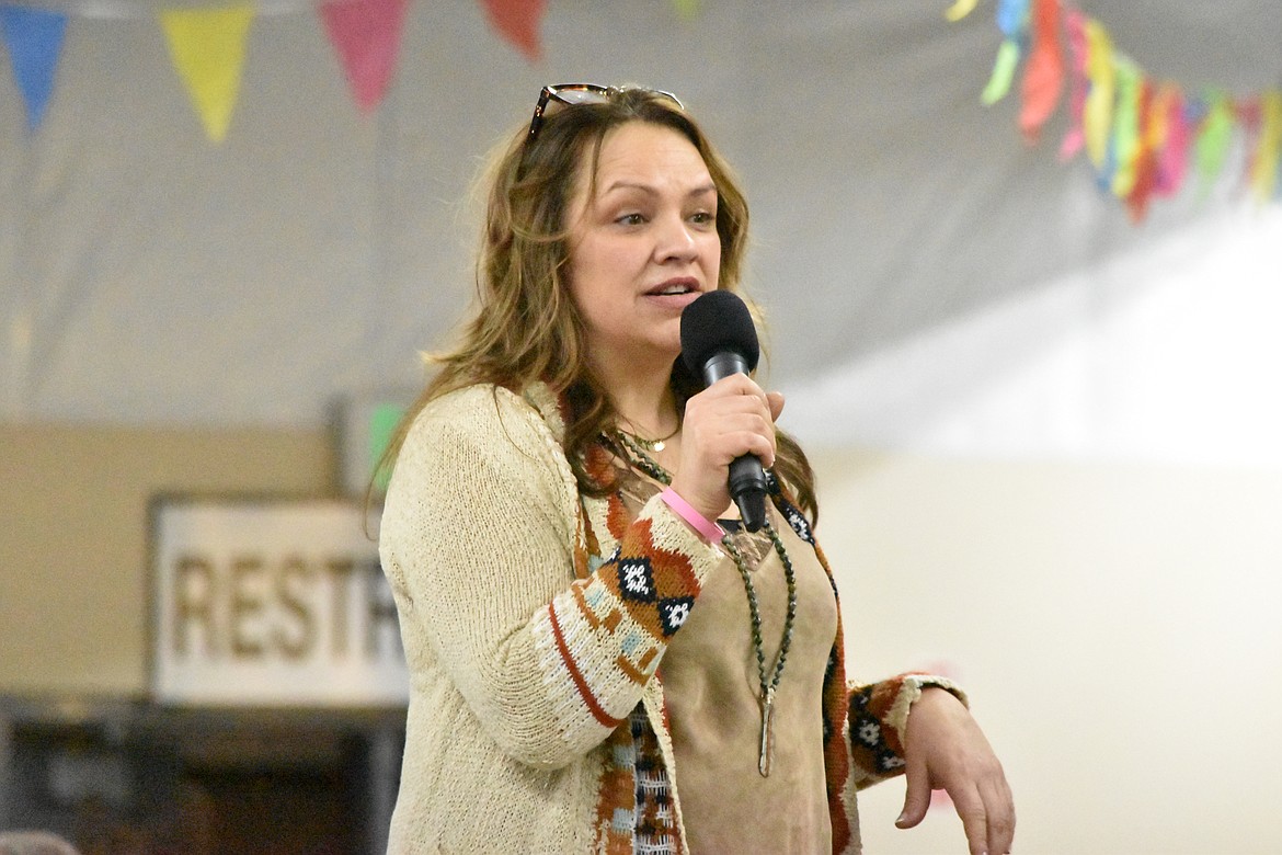 Columbia Basin Cancer Foundation Executive Director Angel Ledesma gives a short speech right before the live auction Saturday at the Country Sweethearts Benefit Auction.
