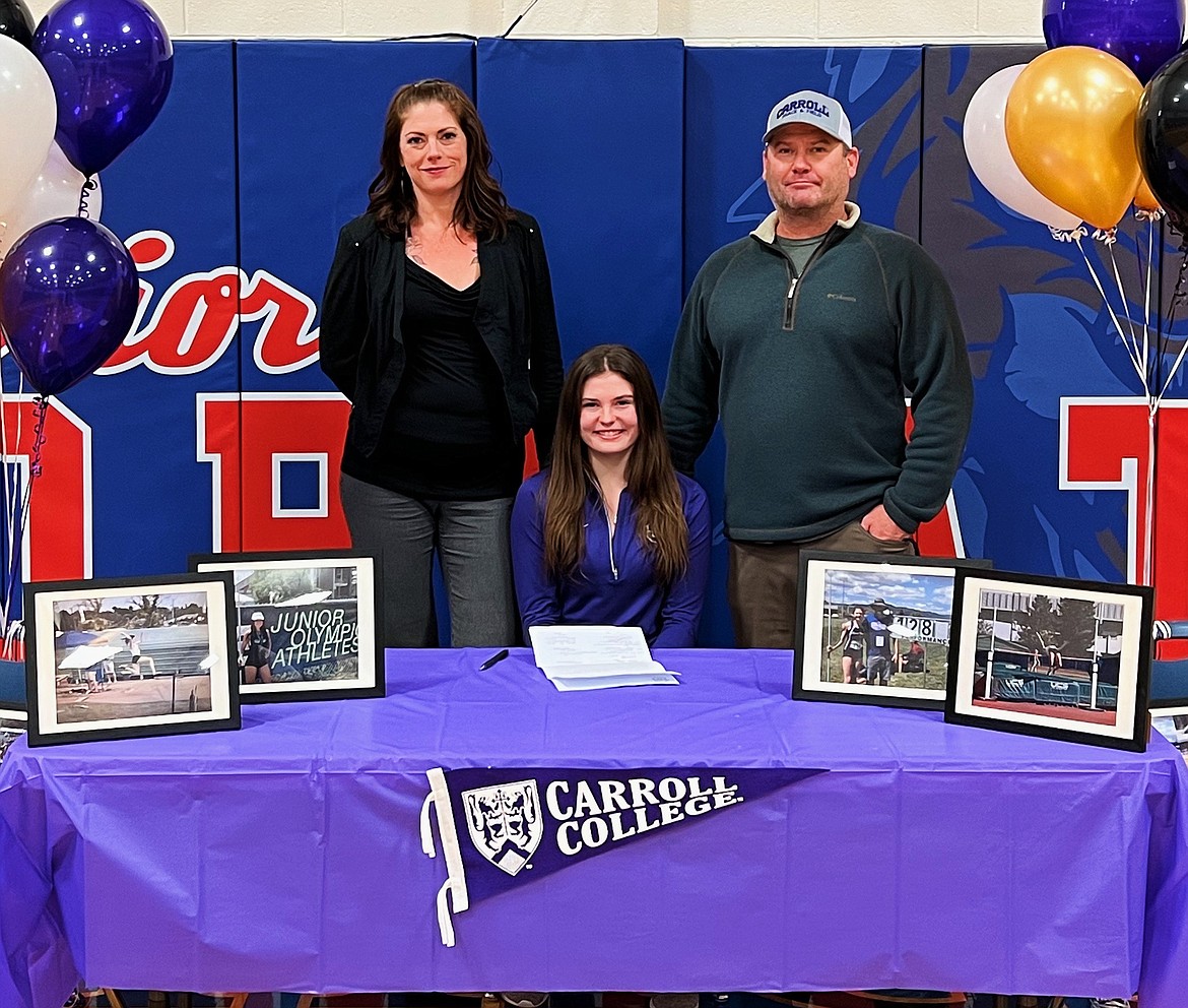 Superior high school senior and track standout Sorren Reese celebrated with her parents Sarah and Josh on her official signing day with Carroll College last month. She received a full tuition scholarship to compete on the track and field team for Javelin and the Heptathlon. (Photo courtesy Sorren Reese)