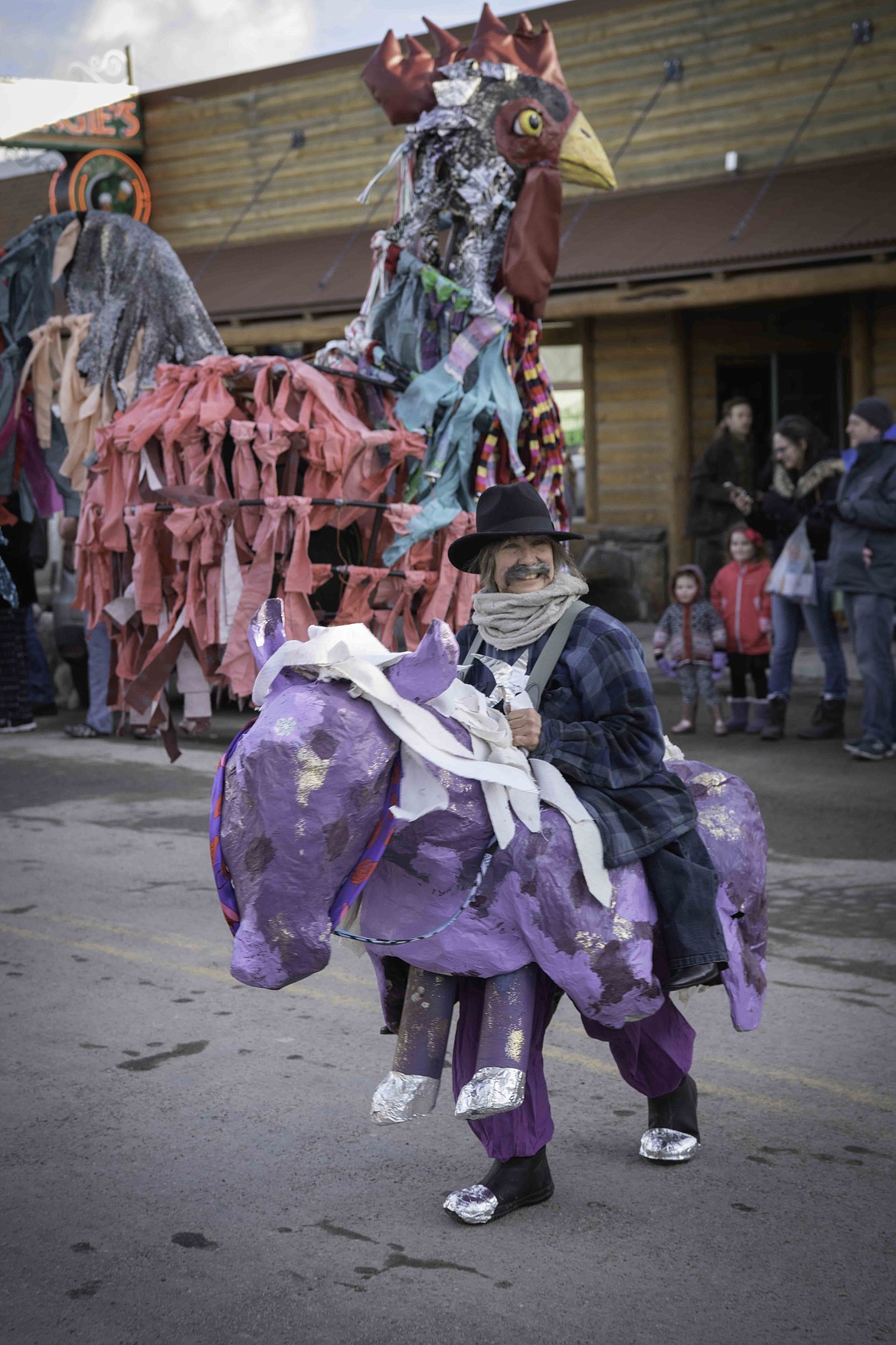 Kathy Lelsa participates in a Chinese New Year parade in Hot Springs. (Tracy Scott/Valley Press)