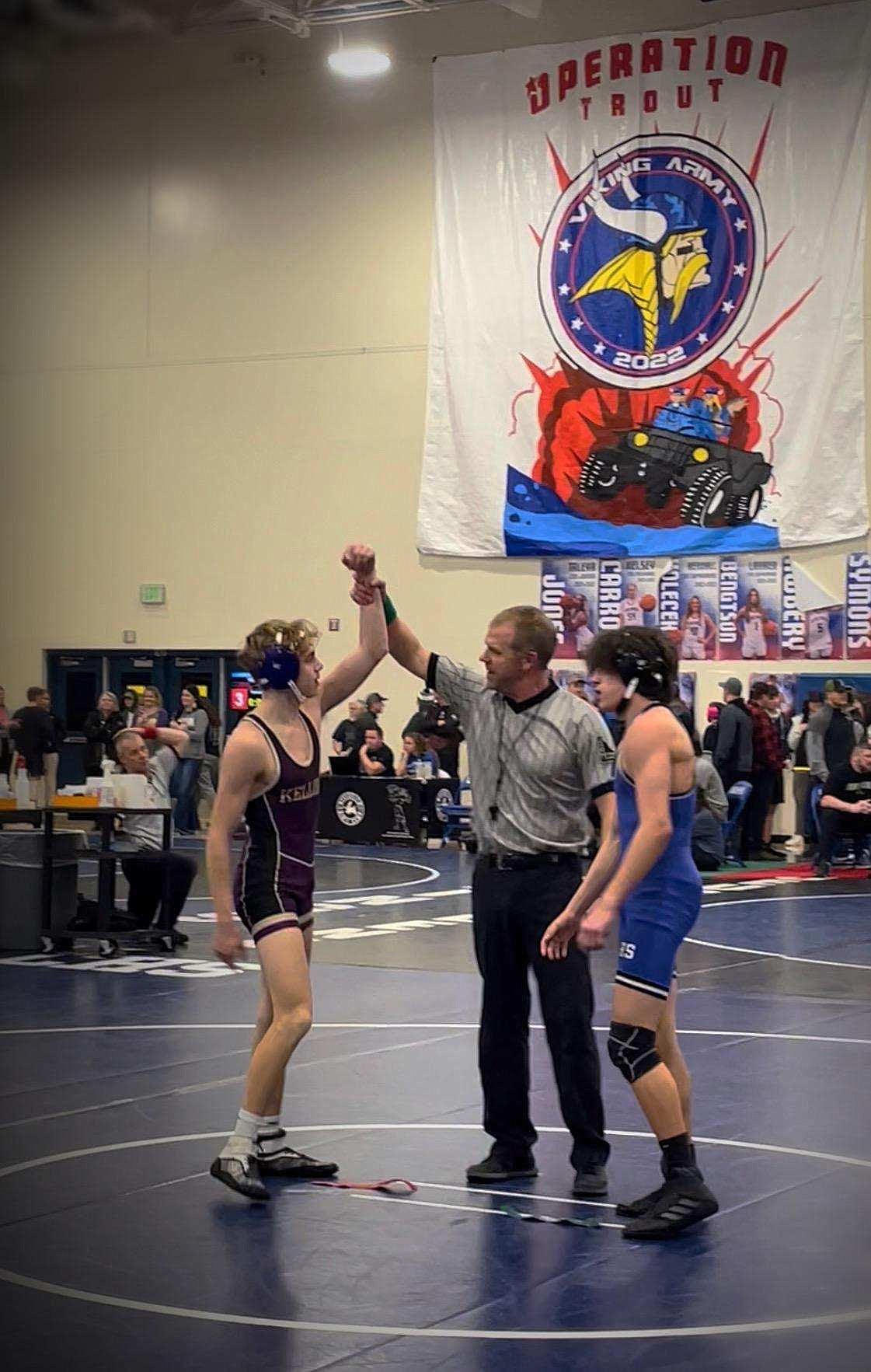 Wildcat Kolter Wood gets his hand raised following a recent match at the North Idaho Rumble.