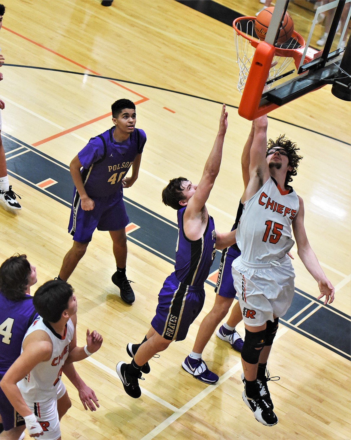 Ronan's Payton Cates puts in a shot in the paint against Polson. Cates finished with 16 points and had six rebounds. (Scot Heisel/Lake County Leader)