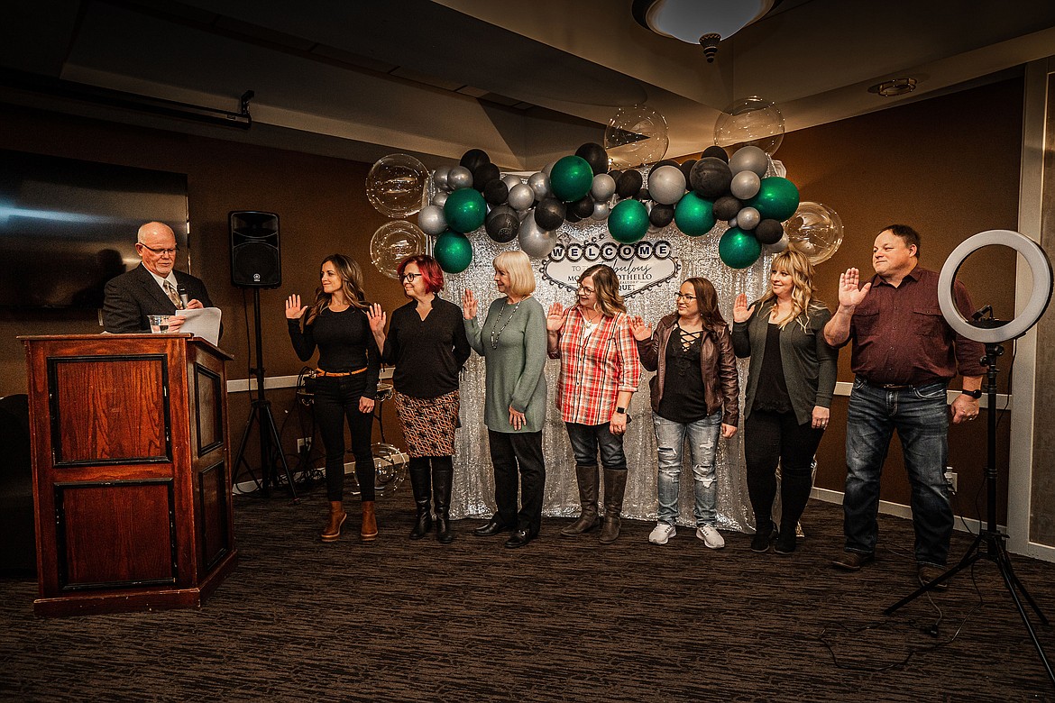 Gary Mann, left, swears in Moses Lake-Othello Association of Realtors board members for 2022 Tami Canfield, Julie Johnson, Sheri Kasparek, Danielle Svilar and Doug Robbins at the association’s annual banquet Jan. 29 at the Pillar Rock Grill in Moses Lake.