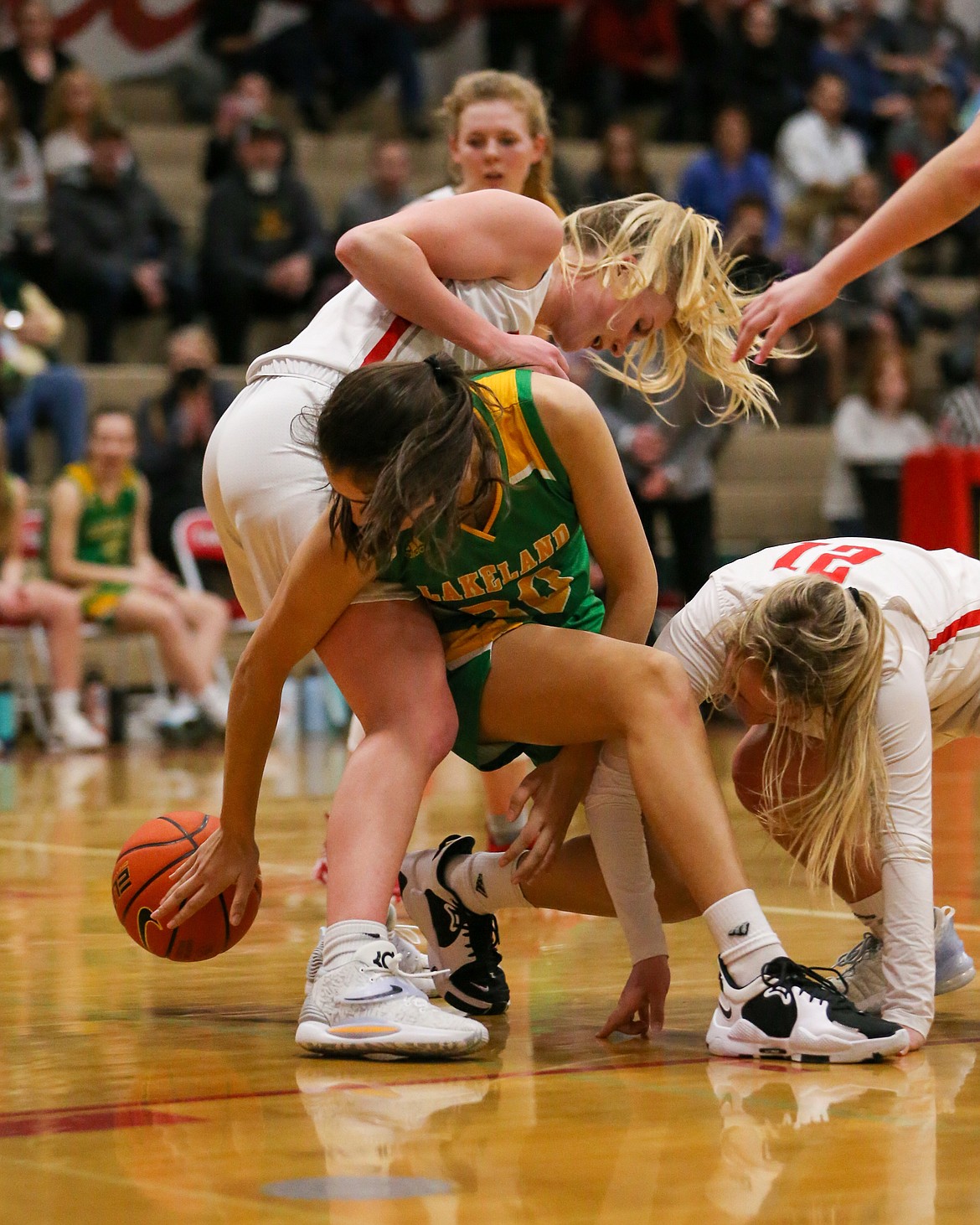 JASON DUCHOW PHOTOGRAPHY
Lakeland High freshman Ziya Munyer battles for a loose ball during Game 1 of the best-of-3 4A Region 1 girls basketball championship series at Les Rogers Court on Wednesday. Sandpoint won the game 48-37 and will host Game 2 on Friday at 6 p.m.