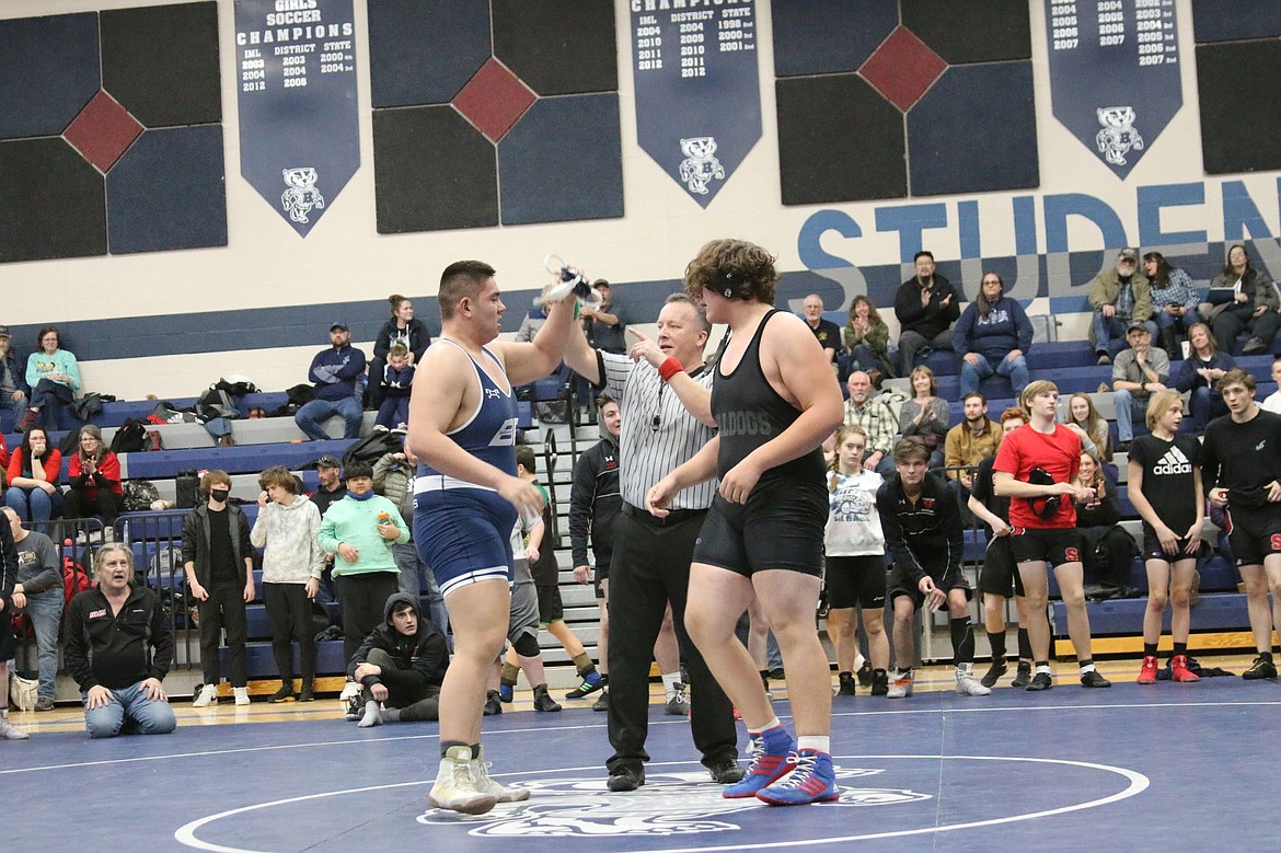 Donald "Donnie" Riess wins over his Sandpoint opponent at the Conrad Garner Invitational.