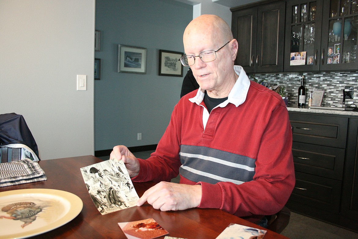 Terry Leas shows a picture Feb. 7 of his mom Delight Leas taken on one of her overseas trips.