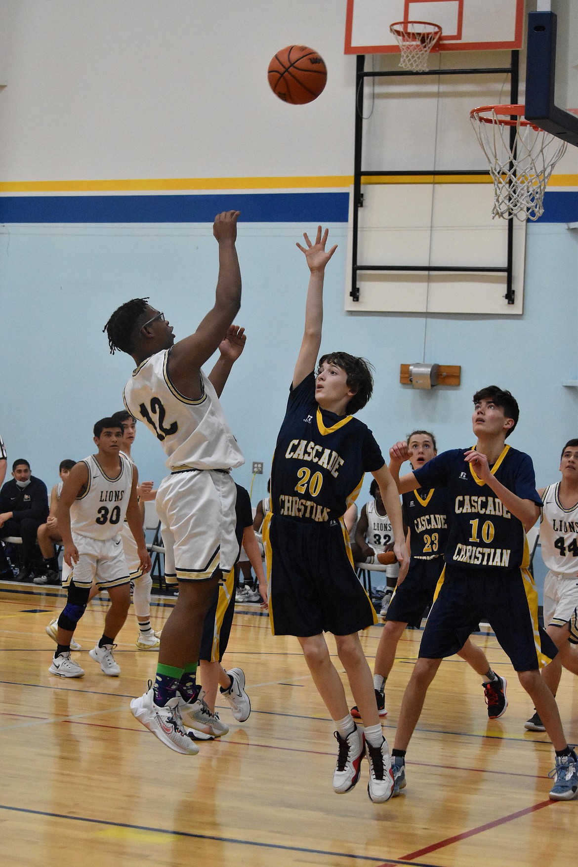 MLCA/CCS senior Kenzy Boorman goes in for a basket as a CCS player attempts to block the shot on Wednesday.