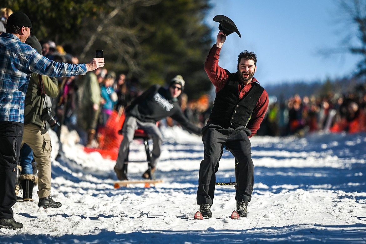 Chronicles of Barnia races Jonny Highfill during the Barstool Ski Races at the 43rd annual Cabin Fever Days in Martin City on Saturday, Feb. 12. (Casey Kreider/Daily Inter Lake)