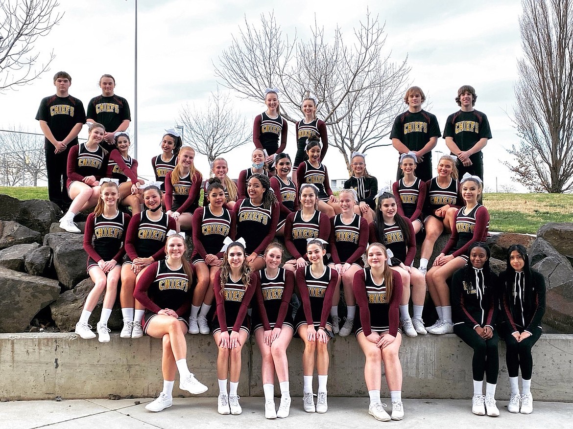 The Moses Lake High School cheer team stops for a picture during state competition Feb. 5.