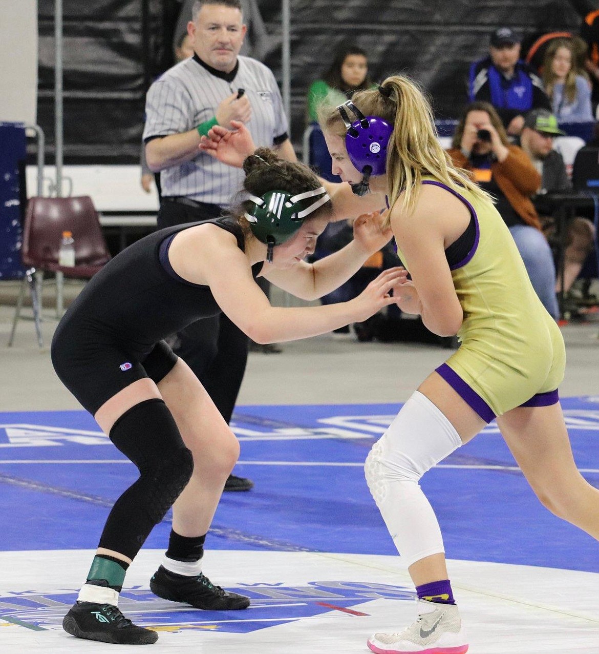 Plains wrestler Brynn Courville (left) finished second in the girls 132-pound category. (Kami Milender photo)