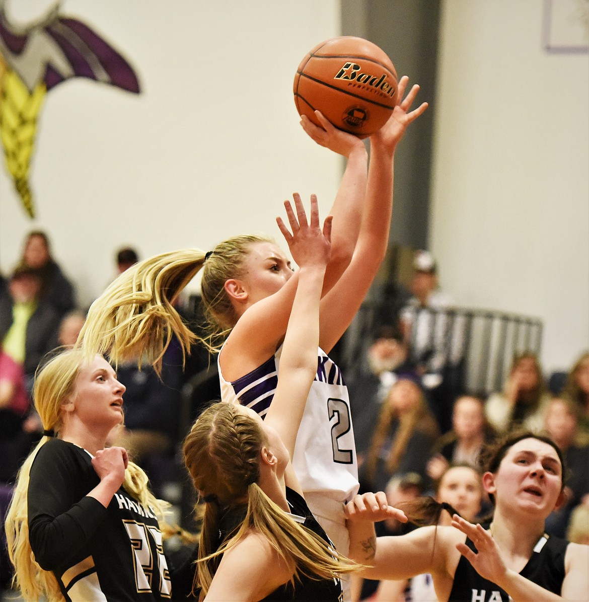 Kassidi Cox puts up a shot in traffic against Seeley-Swan. (Scot Heisel/Lake County Leader)