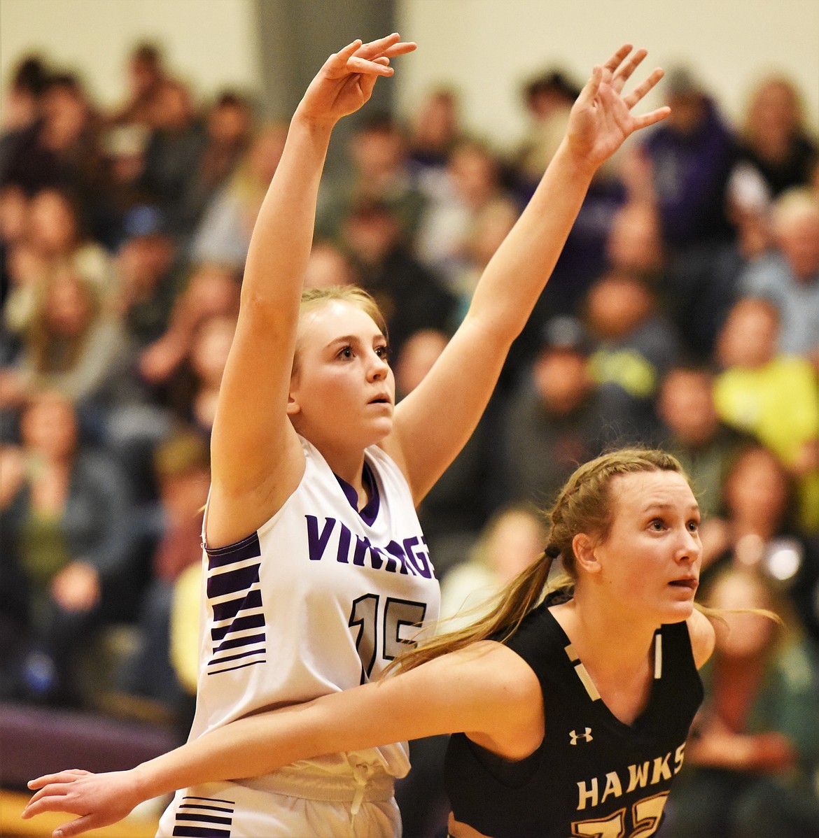 Charlo's Sidney Bauer shoots over Seeley-Swan's Ava Thornsberry. (Scot Heisel/Lake County Leader)