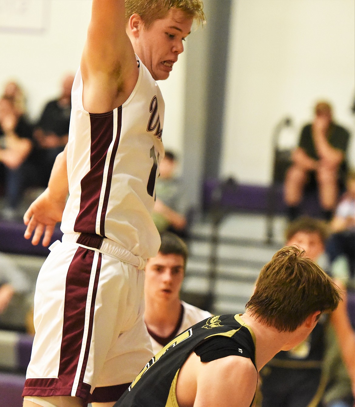 Charlo's Wesley Anderson goes up to defend a shot under the basket. (Scot Heisel/Lake County Leader)