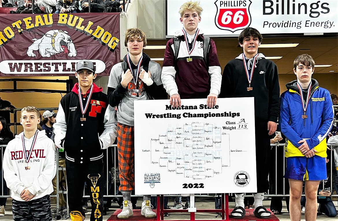 Ronan's Ridge Cote, third from left, was second at 113 pounds. Reece Graves of Sidney/Fairview, center, defeated Cote in the championship match at Billings. (Courtesy of Daisy Adams)