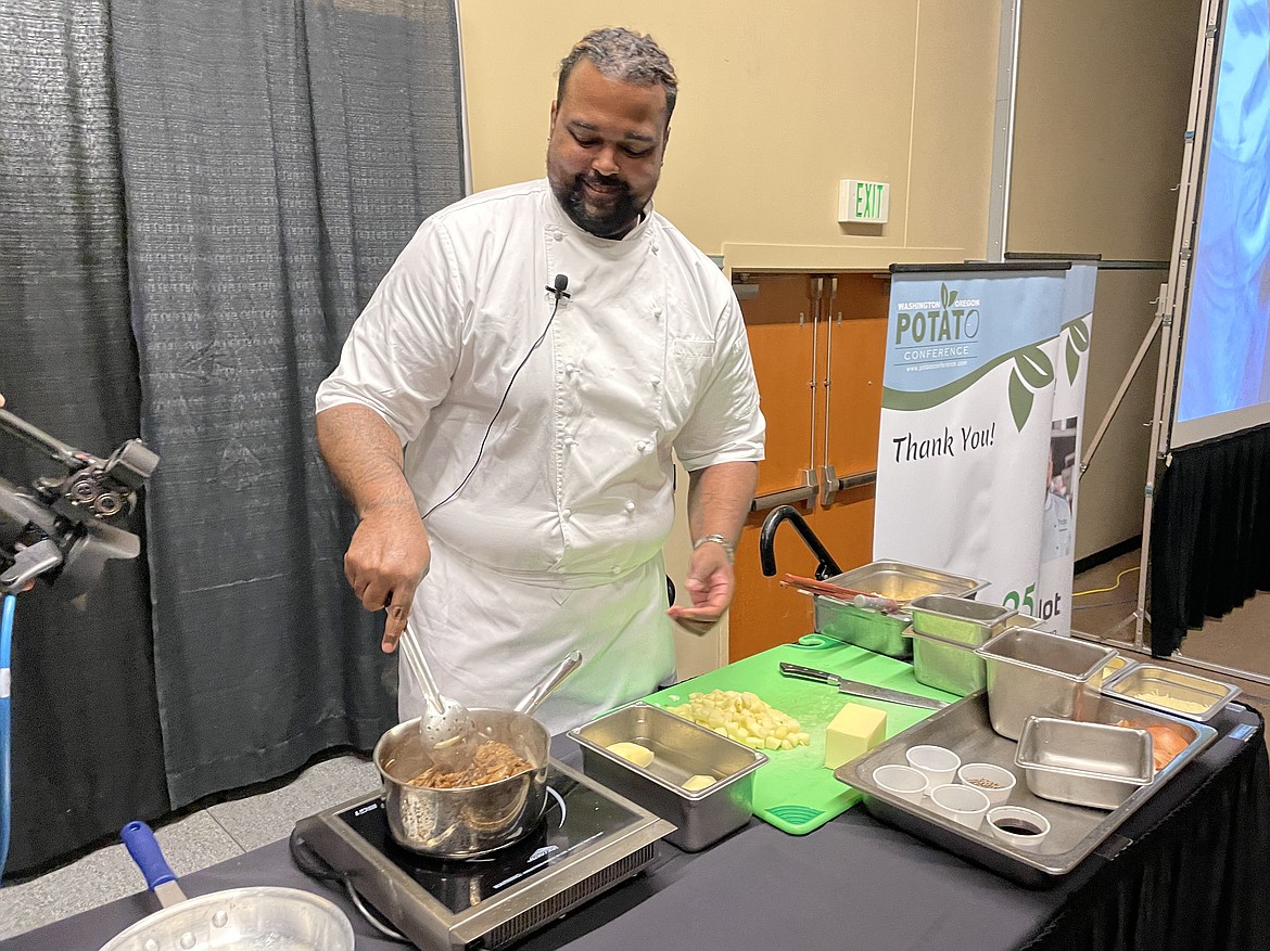 Chef RJ Harvey, culinary director for Potatoes USA, stirs some caramelized onions during a cooking demonstration on making French Onion Potato Casserole during the annual Washington Oregon Potato Conference in Kennewick last week.