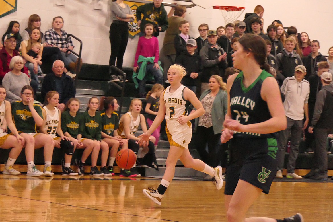 St. Regis guard Carmen Alexander brings the ball up court during Thursday's win over Valley Christian in St. Regis.  (Chuck Bandel/VP-MI)