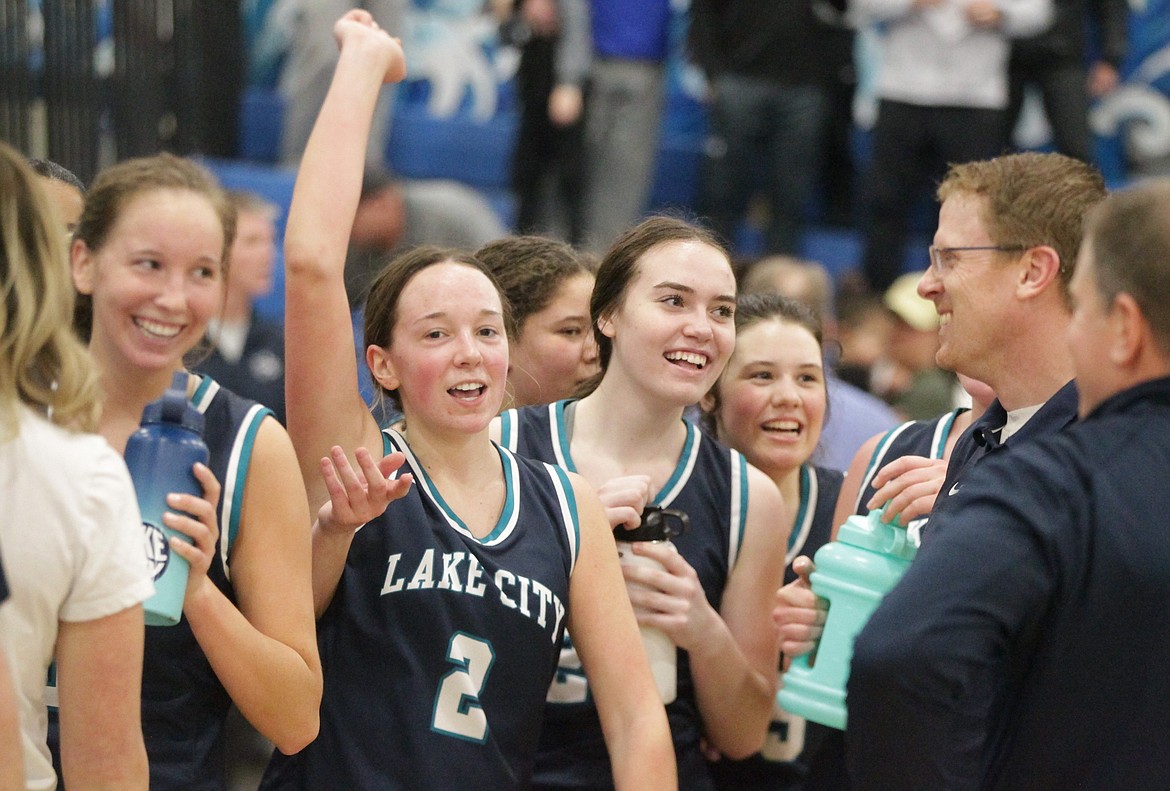 JASON ELLIOTT/Press
Lake City High senior Kendall Pickford, left, Kamryn Pickford, center, and Sadie Zimmerman share a moment following the 5A Region 1 girls basketball tournament at Coeur d'Alene High. Lake City will face Rocky Mountain of Meridian on Thursday at 11 a.m. PST at the Ford Idaho Center in Nampa.