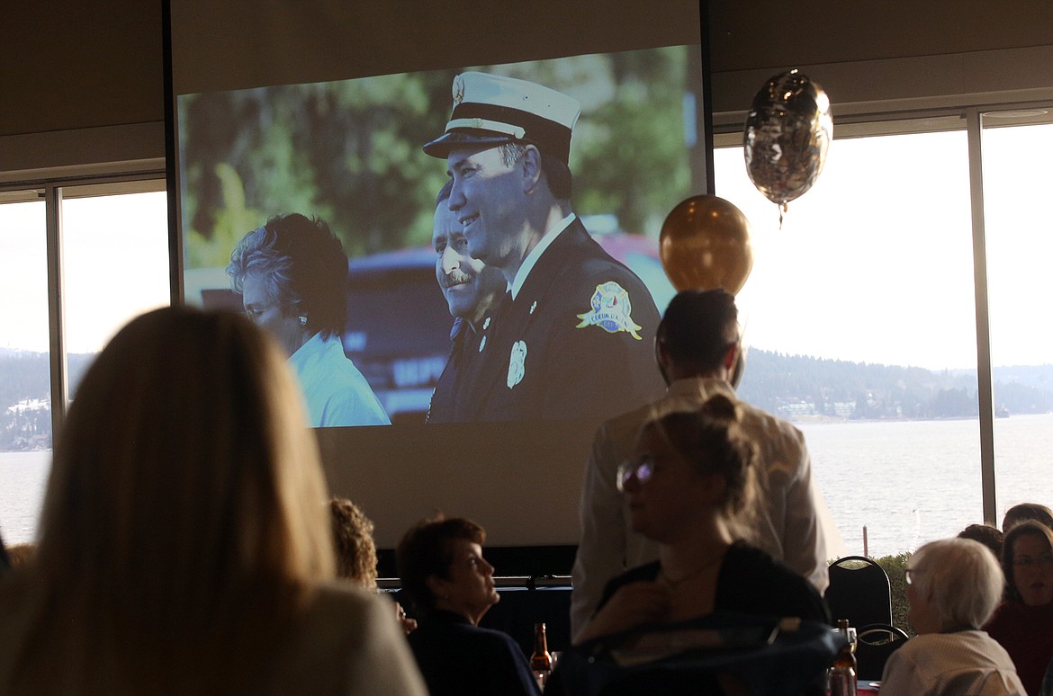 Pictures of Kenny Gabriel's firefighting career filled the screen on Tuesday at the Hagadone Event Center.