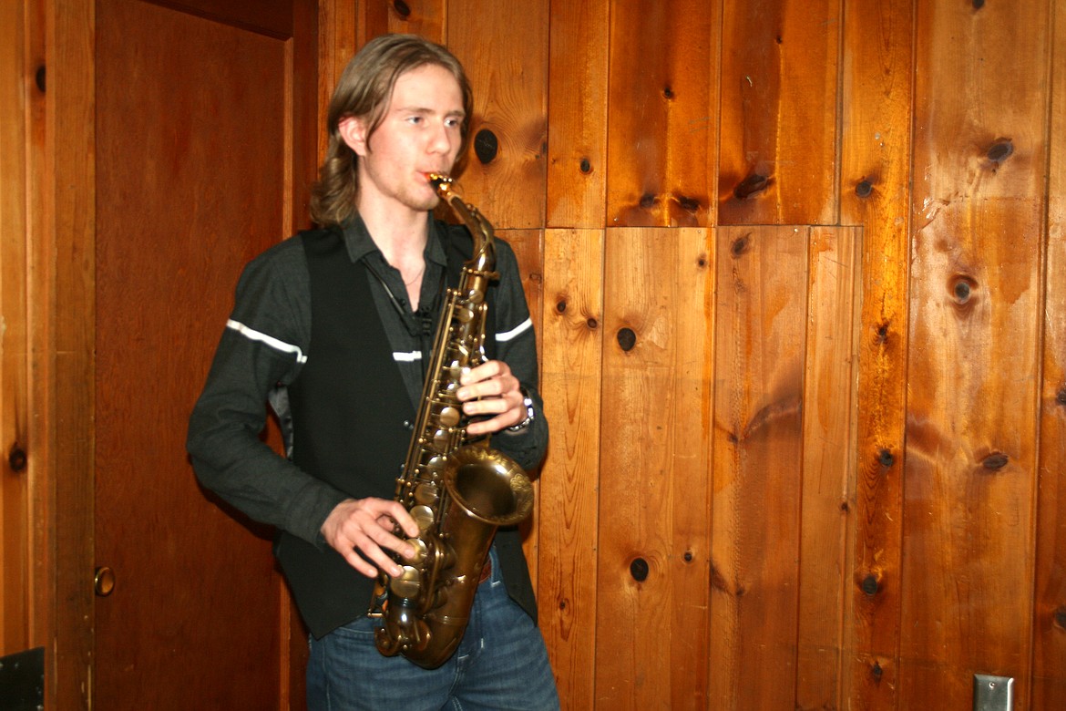 Saxophonist Kurtis Harstad tunes up before a Feb. 12 Moses Lake concert.