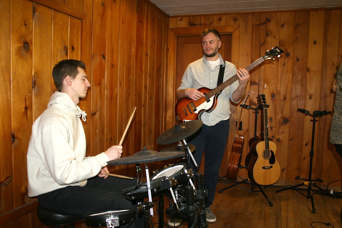 Drummer Greg Stjerngard (left) and bassist Drew Liedtke (right) of the band Some Other People do a sound check before performing Feb. 12 in Moses Lake.