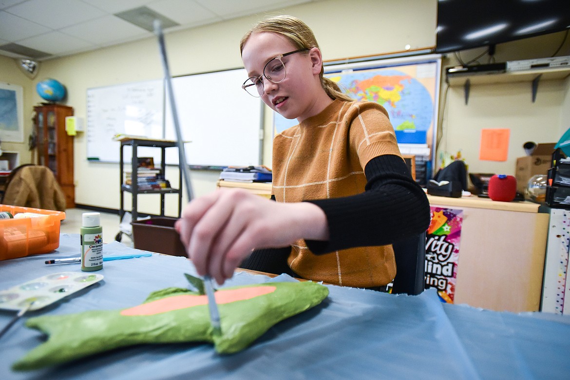 Seventh-grader Bryn Moir works on a paper mache fish at Fair-Mont-Egan School on Tuesday, Feb. 15. (Casey Kreider/Daily Inter Lake)