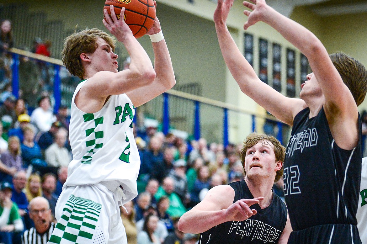 Glacier's Connor Sullivan (2) looks to shoot against Flathead  at Glacier High School on Thursday, Feb. 17. (Casey Kreider/Daily Inter Lake)