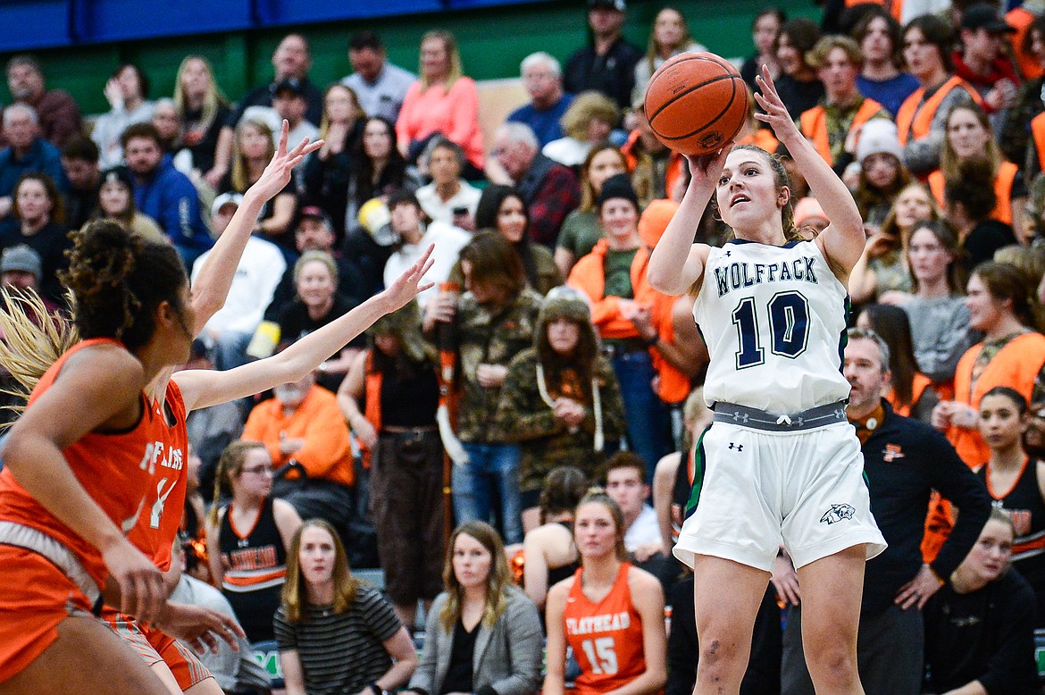 Glacier's Bethany Sorensen (10) shoots a three against Flathead at Glacier High School on Thursday, Feb. 17. (Casey Kreider/Daily Inter Lake)