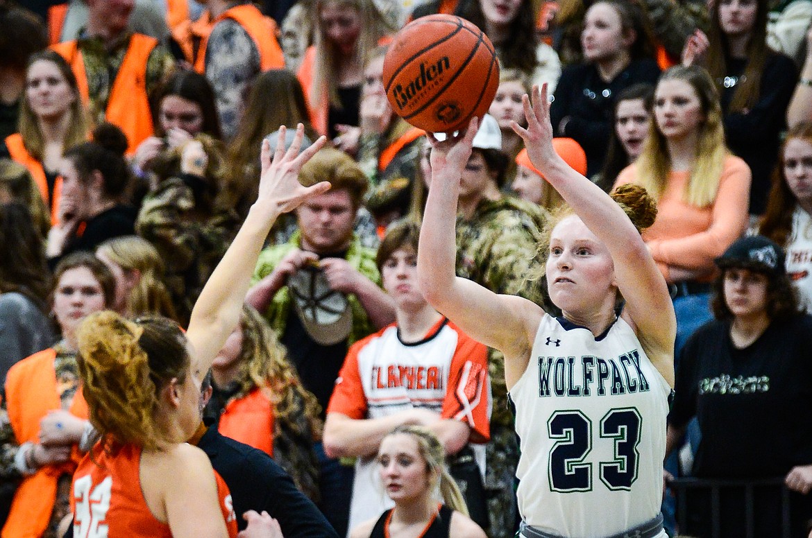 Glacier's Reese Ramey (23) shoots a three against Flathead at Glacier High School on Thursday, Feb. 17. (Casey Kreider/Daily Inter Lake)