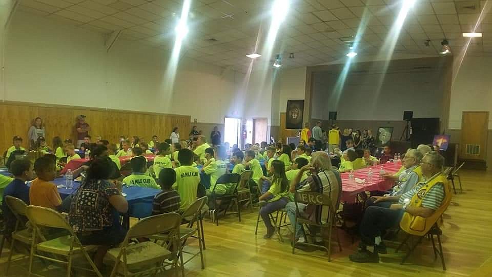 Ephrata Lions members host dinner for participants in the club’s “Junior Jogger” program.