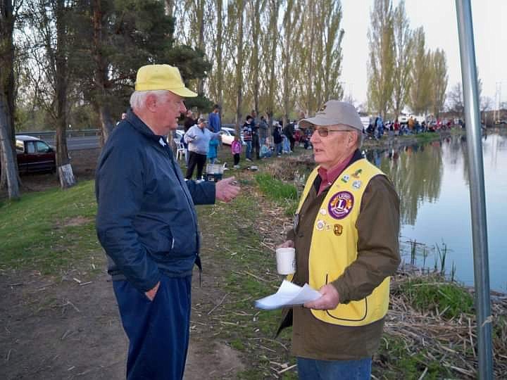 Ephrata Lions members Don Gordon (left) and Bob Sieverkropp (right) during the annual fishing derby.