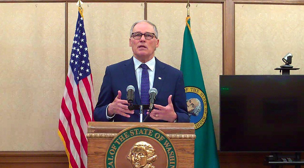 A screenshot of Gov. Jay Inslee speaking at an online press conference announcing the end of the statewide mask mandate on March 21.