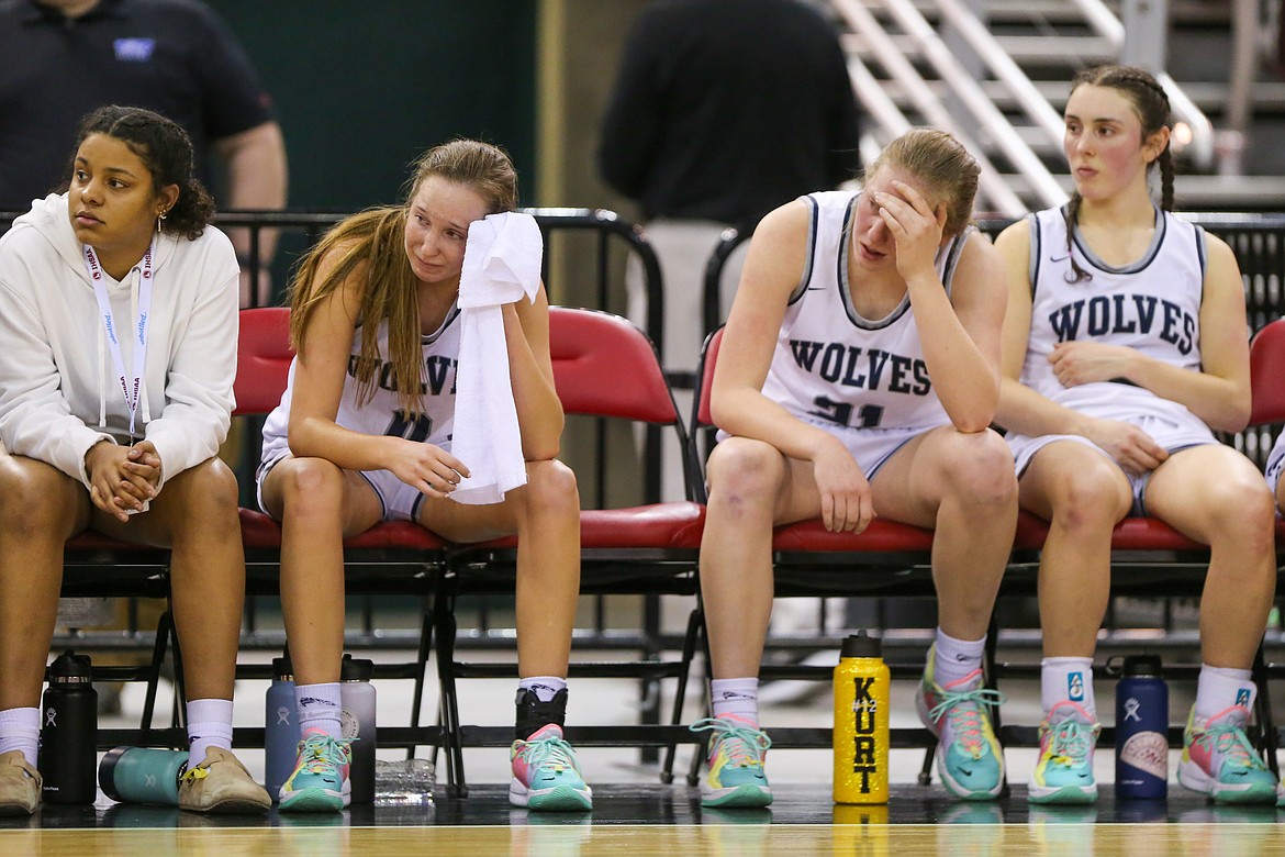 JASON DUCHOW PHOTOGRAPHY
From left, Kaliah Frazey, Kendall Pickford, Emberlyn Reynolds and Allie Bowman watch the final seconds of Lake City's loss to Boise in a state 5A girls basketball semifinal game Friday night at the Ford Idaho Center in Nampa.