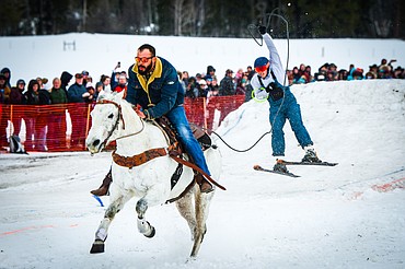 A rider and skier navigate a jump in the course at Whitefish Ski Joring on Saturday, Feb. 19. (Casey Kreider/Daily Inter Lake)