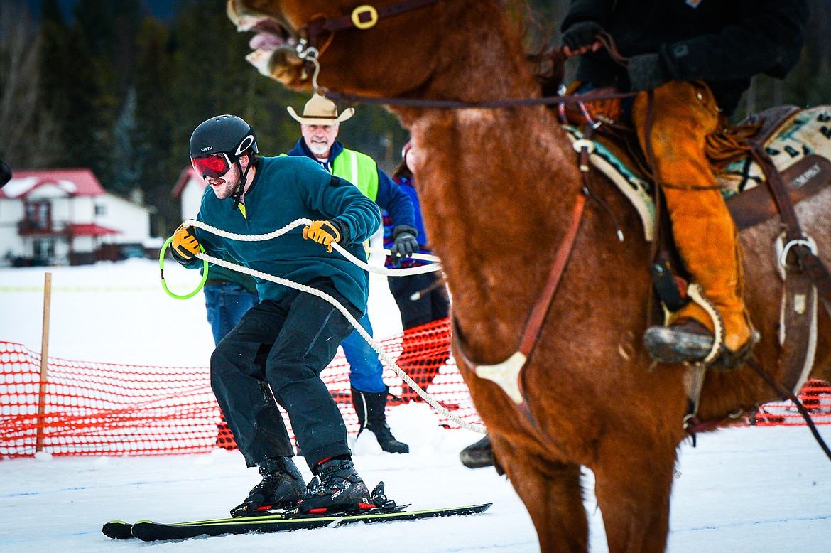 A rider and skier near the finish line in the Sport Class at Whitefish Ski Joring on Saturday, Feb. 19. (Casey Kreider/Daily Inter Lake)