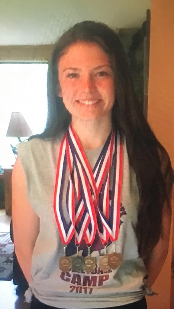 Superior senior Sorren Reese with a sampling of track and field medals she has accumulated. Reese has signed a college scholarship offer to participate in track at Carroll College in Helena. (Photo courtesy of Reese family)