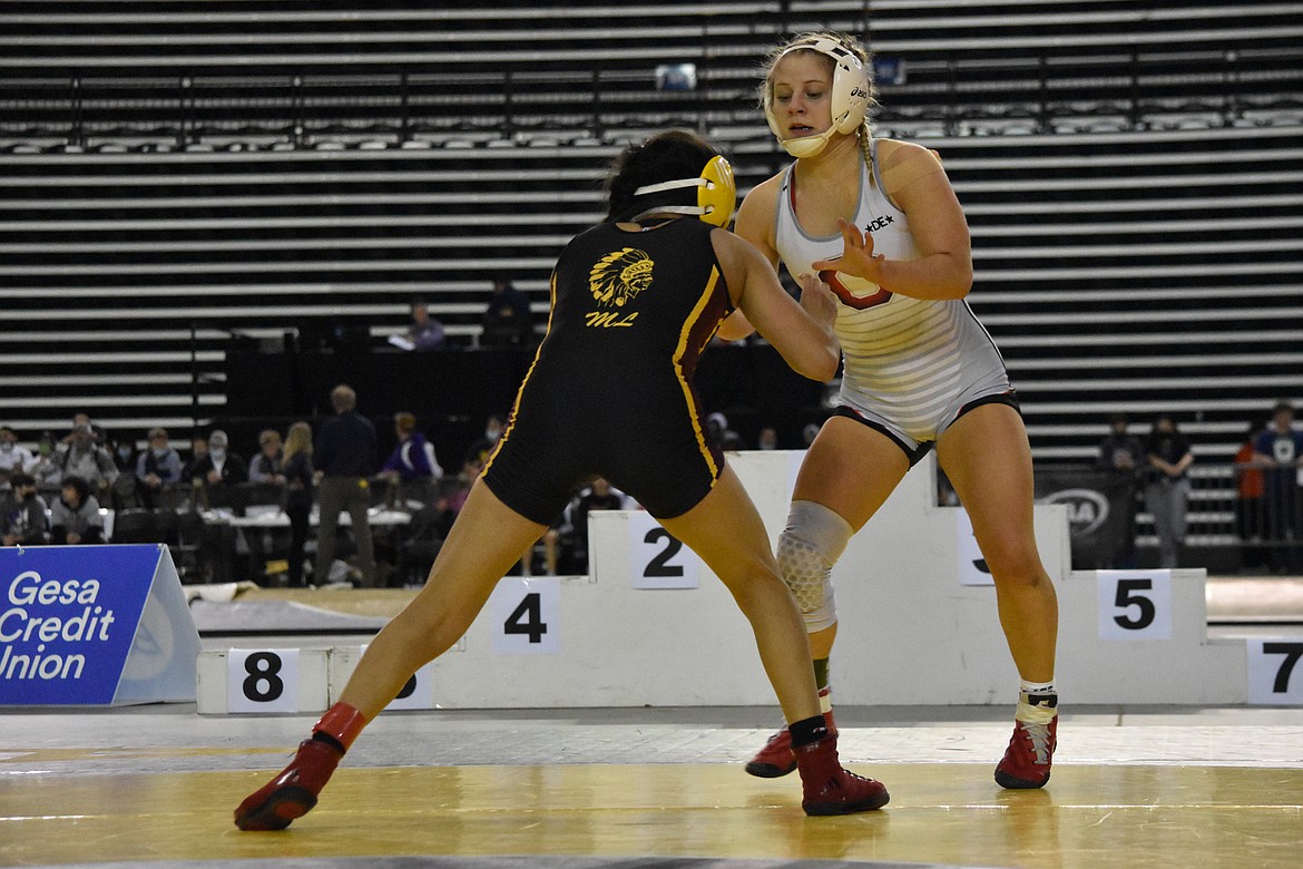 Moses Lake High School sophomore Ashley Dayana Naranjo, left, took on Othello High School senior Alexis Monday, right, in the championship round of the girls 115-pound weight class during the WIAA Mat Classic XXXIII state tournament on Feb. 19. Naranjo beat Monday, taking the state title.