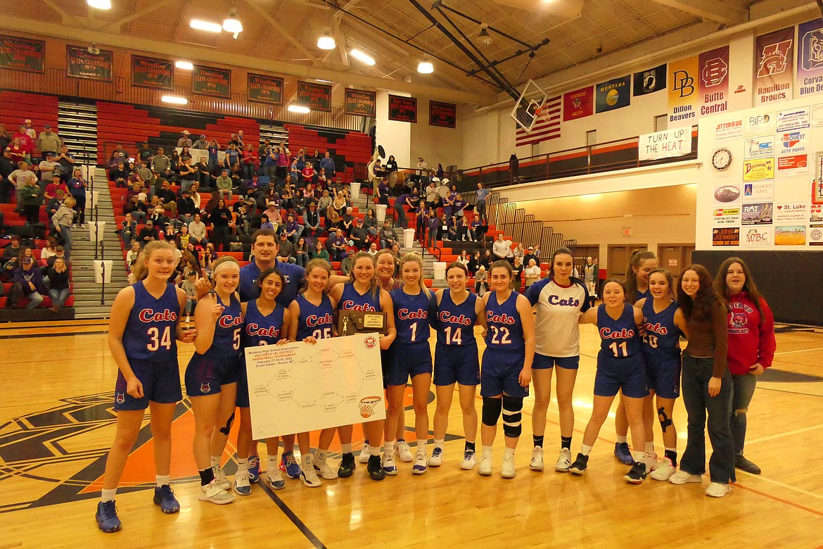 Superior players and coaches display their hardware after winning the Western 14C girls basketball tournament Saturday in Ronan. (Chuck Bandel/MI-VP)