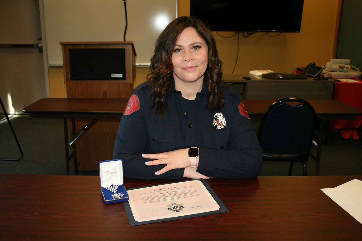 Lynn Falconer displays the awards she received as 2021 Paramedic of the Year for the Moses Lake Fire Department.