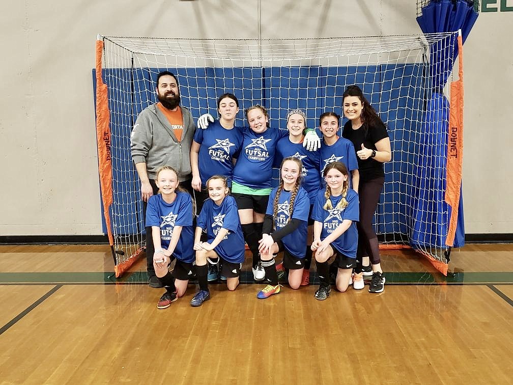 Courtesy photo
FC North Idaho Girls 10/11 Rider competed in the EW Surf Futsal tournament on Sunday at The Warehouse Athletic Facility in Spokane. After three wins in the bracket play, the FC North Idaho girls advanced to the championship where they won 3-0 versus Surf G10. The team scored a total of 22 goals and only allowed 5 in the tournament. In the front row from left are Abigale Smith, Lexie Barth, Eva Berzoza and Ashlynn Fassler; and back row from left, assistant coach Alex Navarrete, Lizzie Applegate, Cayla Zlateff, Gabriella Navarrete and director/head coach Ashley Rider.