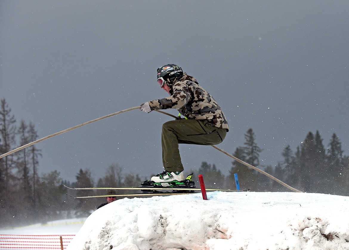 A skier competitor heads over the final jump on the course at the Whitefish Ski Joring event on Sunday. (Whitney England/Whitefish Pilot)