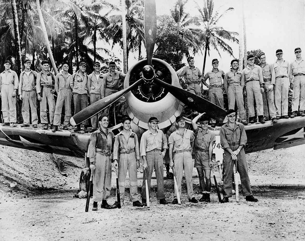 This famous photo of Pappy Boyington’s VMF-214 Marines Black Sheep Squadron shows everyone wearing a St. Louis Cardinal baseball cap, each cap donated by the team for every Japanese plane the squadron shot down — so many that everyone, including ground crew, got one.