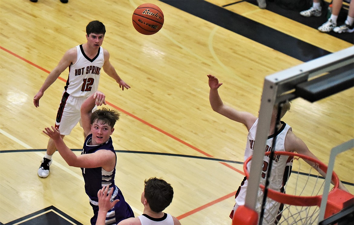 Charlo's Tucker Love puts up a shot in the lane during the Vikings' semifinal game against Hot Springs. (Scot Heisel/Lake County Leader)