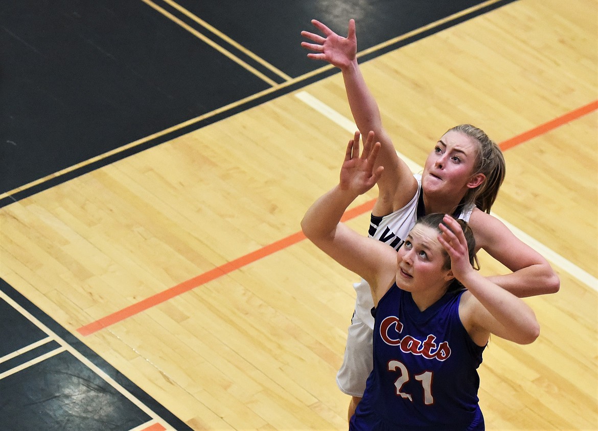 Charlo's Kassidi Cox goes up for a rebound against Alberton-Superior. (Scot Heisel/Lake County Leader)