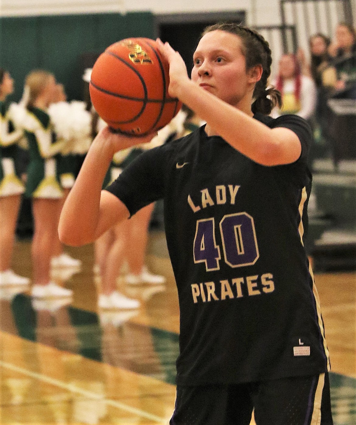 Polson's Mckenna Hanson takes a shot during the Lady Pirates' district play-in game at Whitefish. (Courtesy of Bob Gunderson)